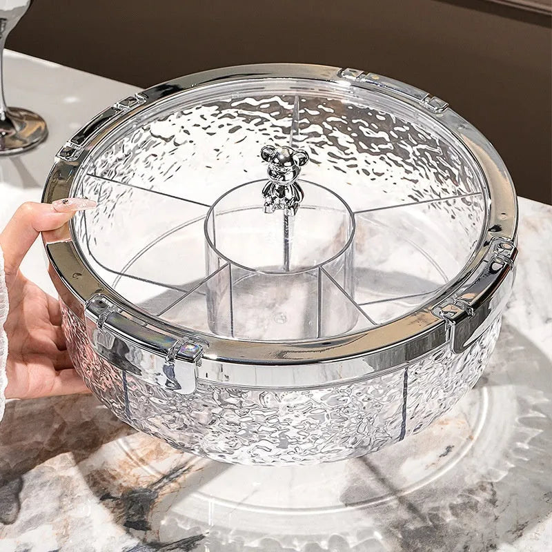 Sealed plastic candy box with lid in milk silver, transparent silver or transparent grey silver, holding dried fruit or sweets.