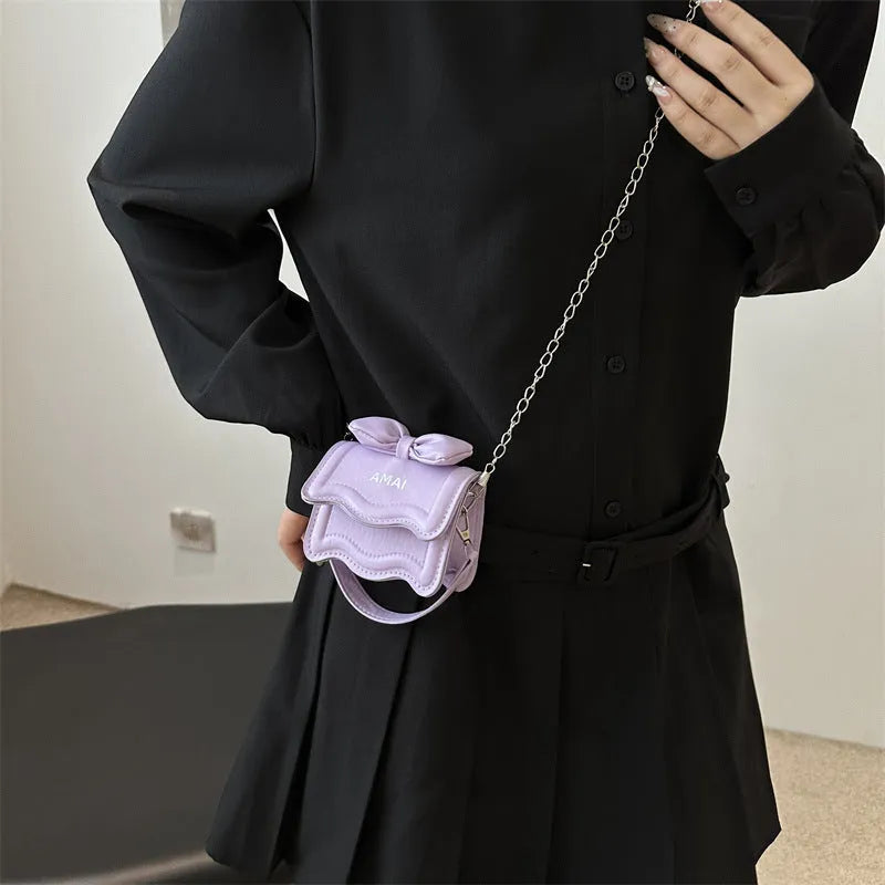 Small women's PU leather crossbody bag in seven colour options with single shoulder strap
