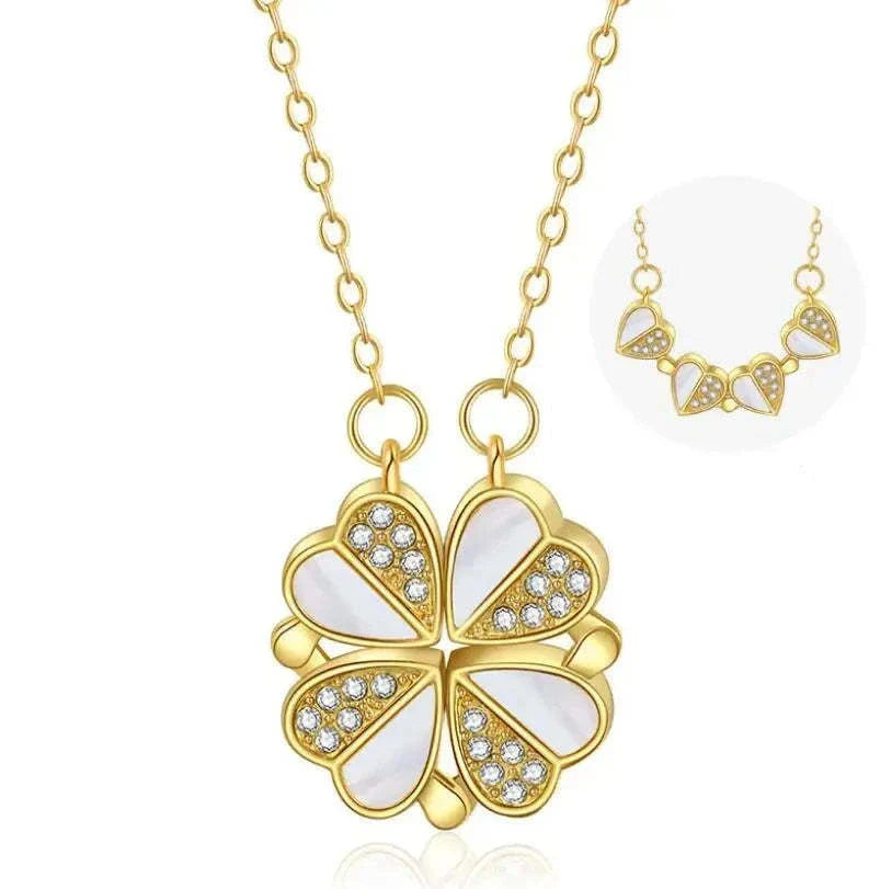 Stainless steel four-leaf clover pendant necklace with crystal heart detail, showcased in various angles and colors