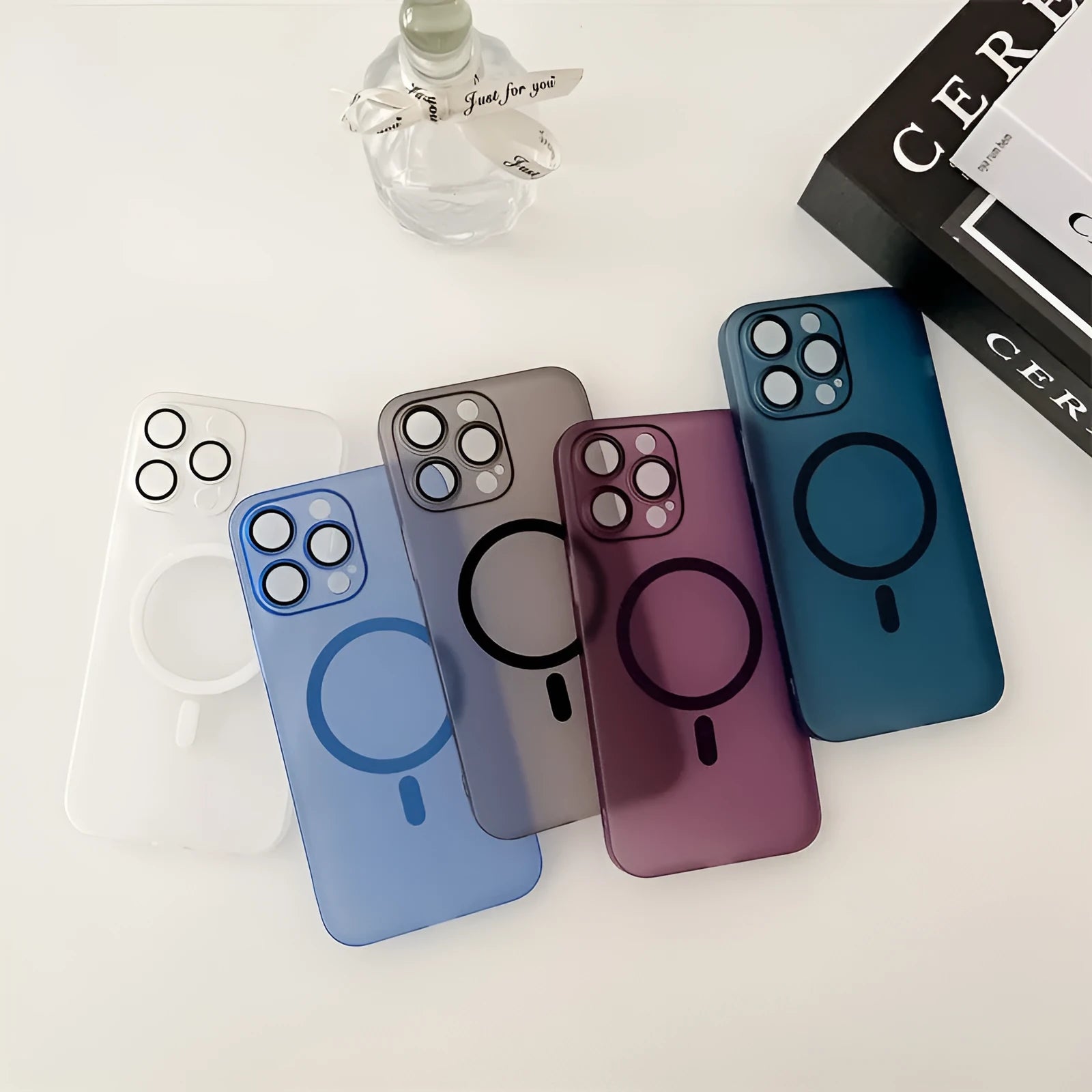 Ultra-thin magnetic frosted phone case for iPhone in ice mist white, showing all-inclusive bumper design