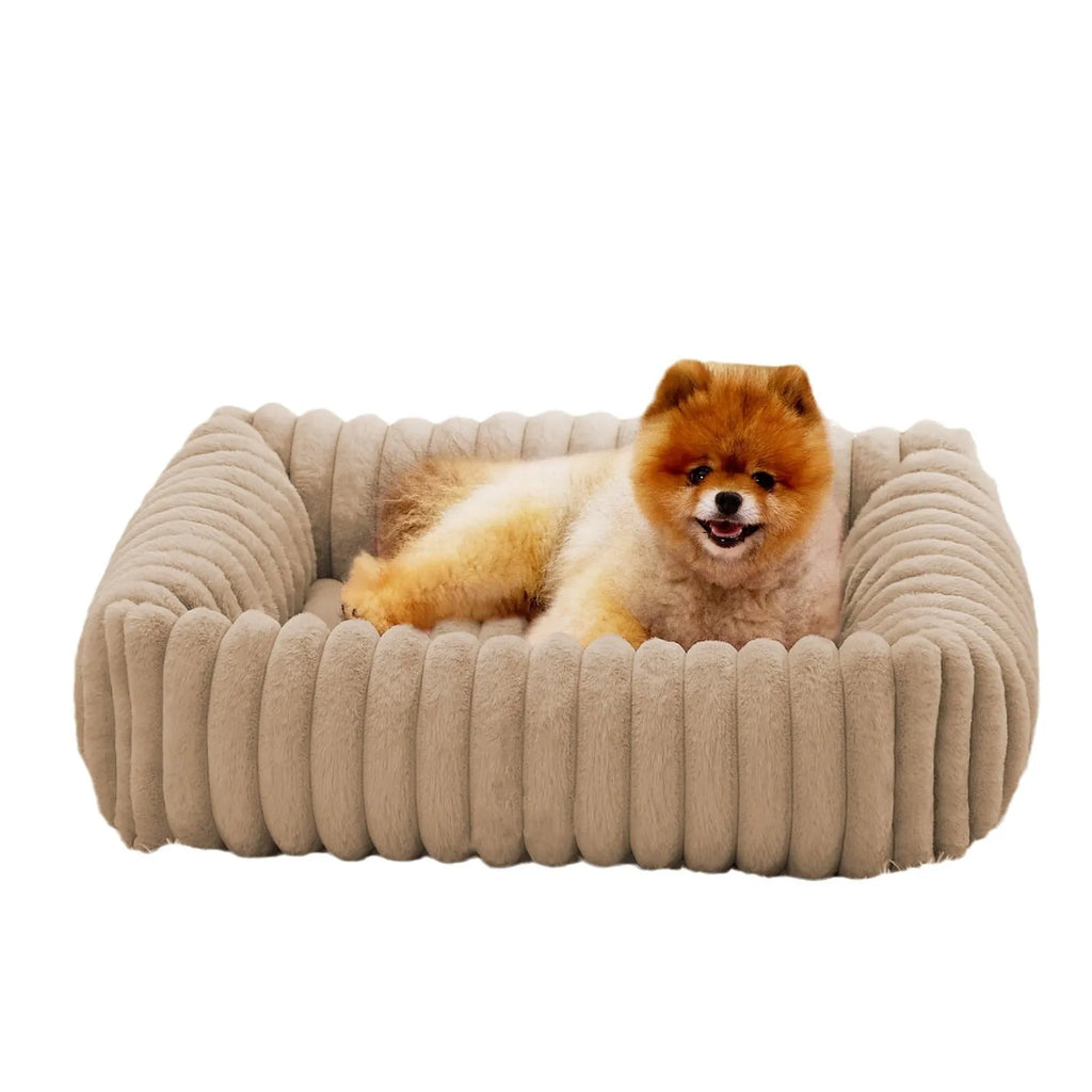 Dog bed with removable cover in beige colour showing four available size options