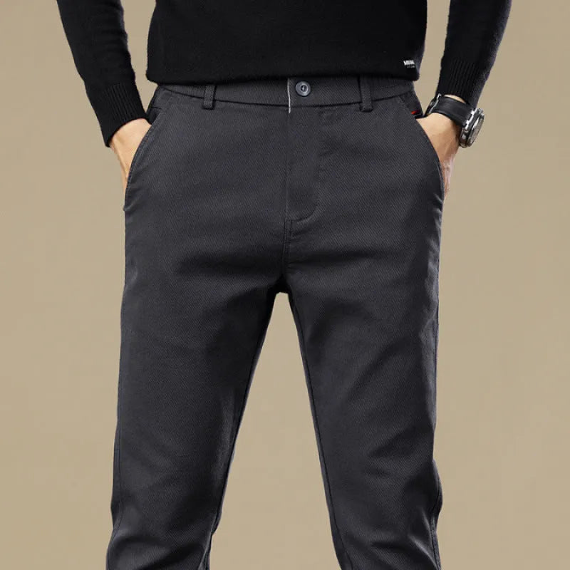 Men's fleece-lined slim fit tapered casual pants in black cotton fabric