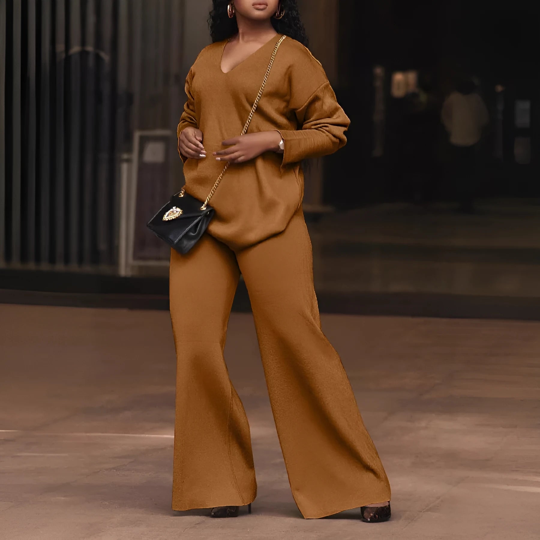Women's brown suede velvet two-piece suit with split sleeve design and full-length trousers