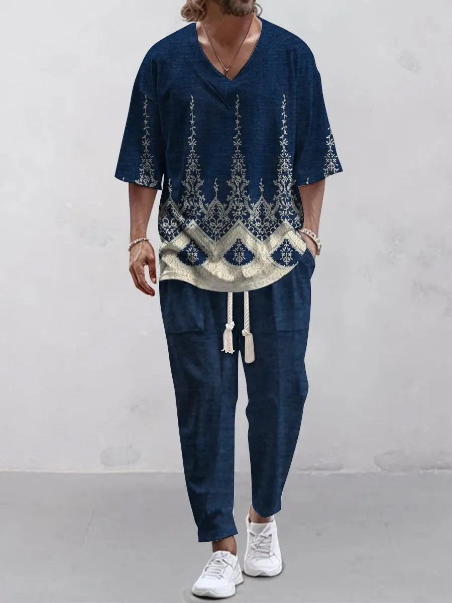 Women's cropped sleeve V-neck trousers suit in thin polyester fabric showing jacket and matching trousers