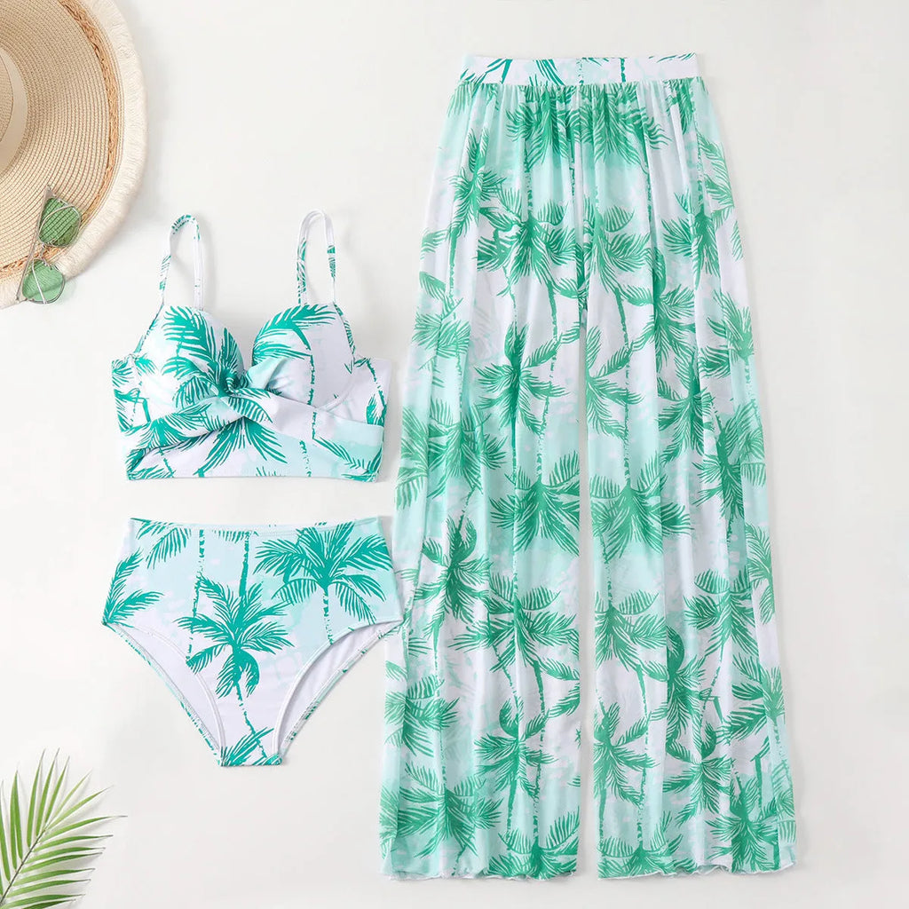 Women's bikini three-piece suit with printed pattern, available in black, blue, and emerald green colours