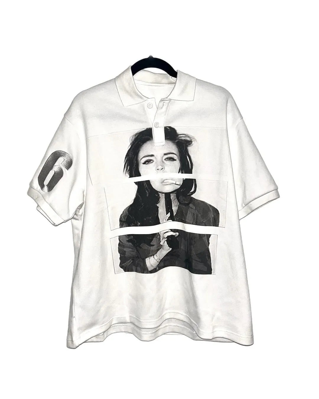 Short-sleeved polo shirt with printed pattern design in straight cut polyester construction