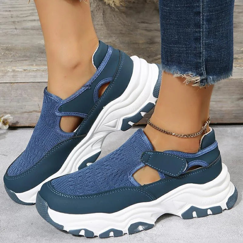 Women's mesh sport shoes with round toe, low heel, and Velcro fastening in a solid colour