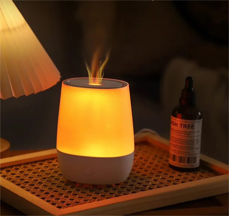 White USB aromatherapy humidifier with simulated flame effect showing 125ml water tank capacity