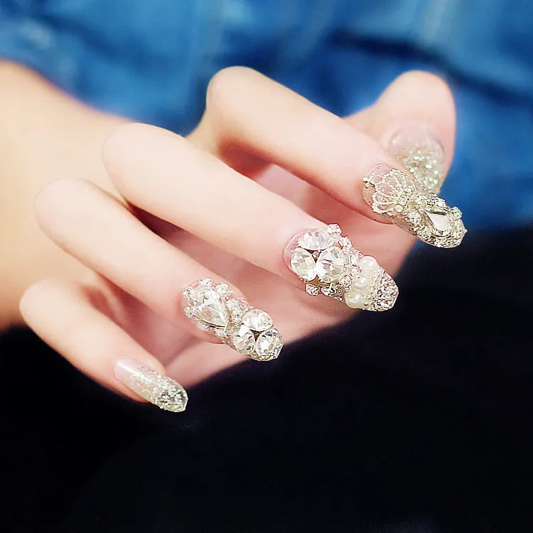 Finished fake nails set of 24 with silver water drops pattern in wearing armour style