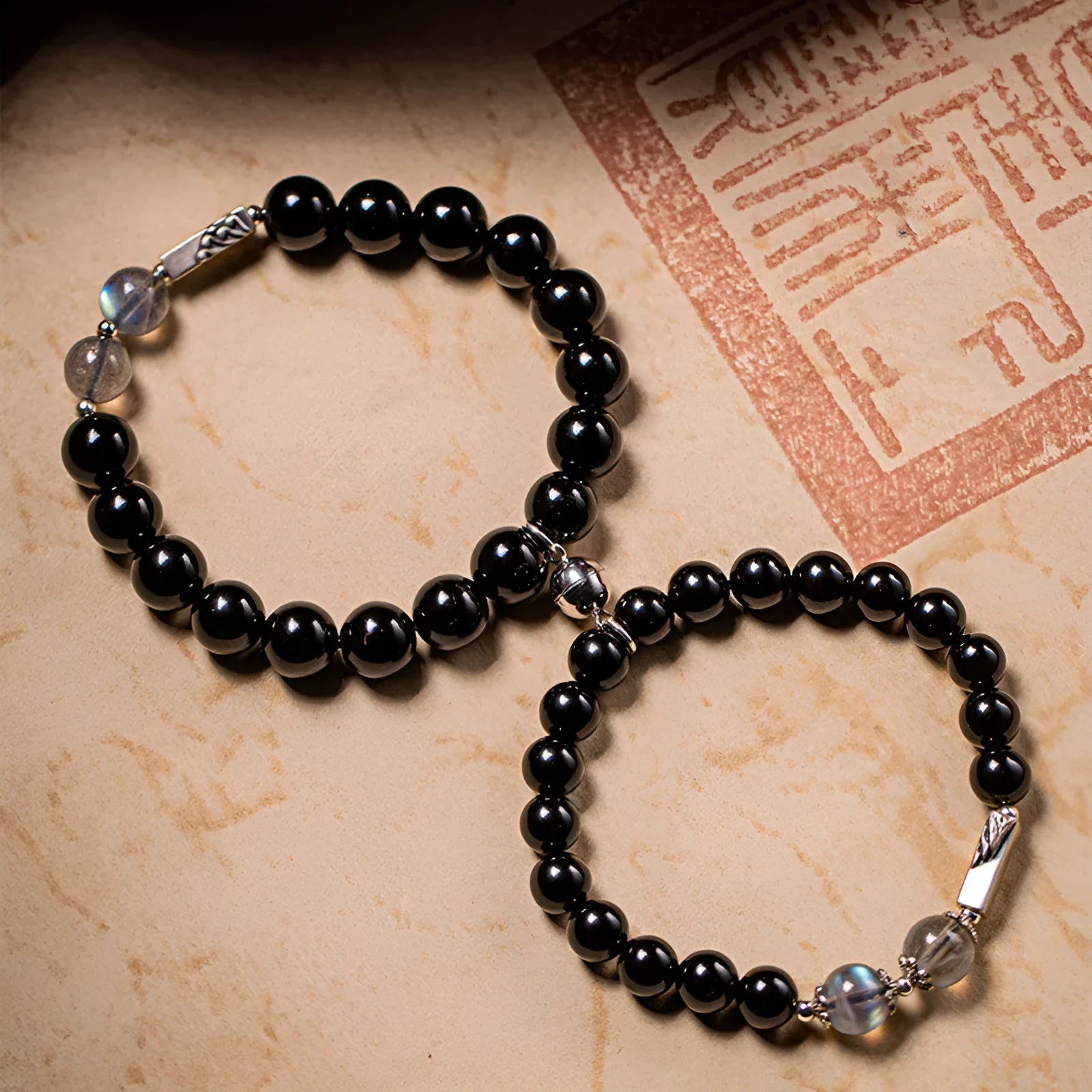 Obsidian Buddha beads couple bracelet DIY kit showing 8mm and 10mm beads with national style design
