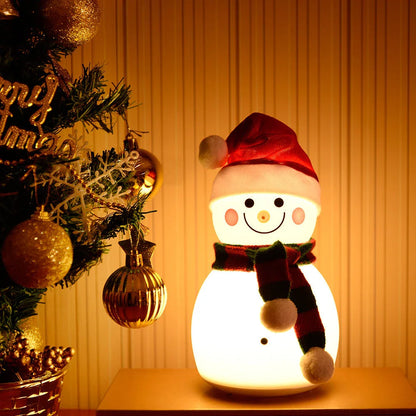 Snowman-shaped rechargeable night light with seven color-changing modes, portable and durable silicone construction