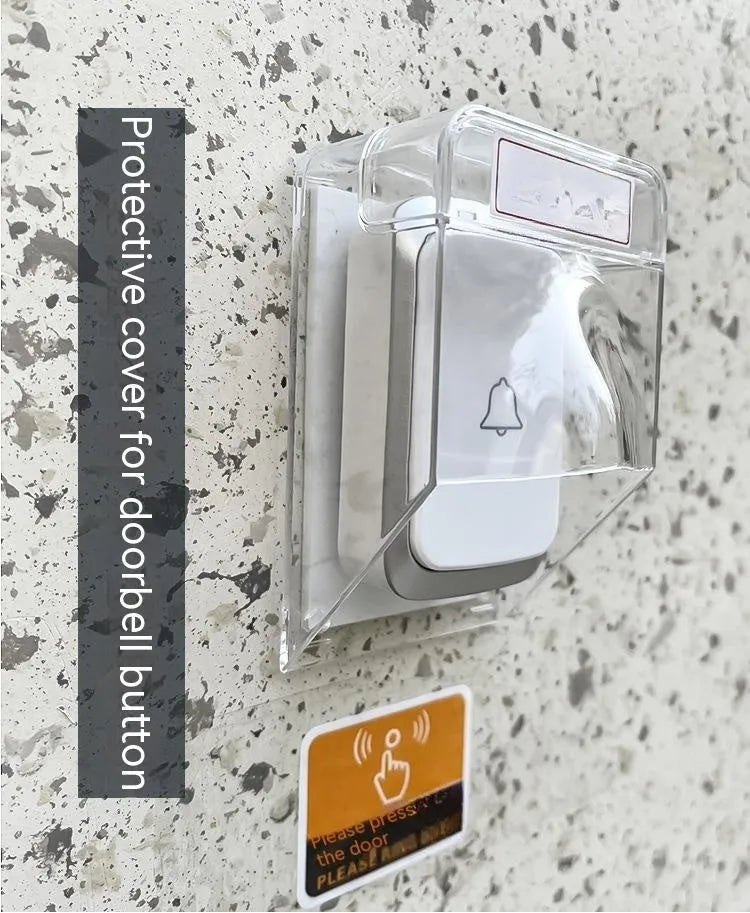 Transparent PC doorbell rain cover, 111 x 64 x 52mm, protecting a doorbell button from rain