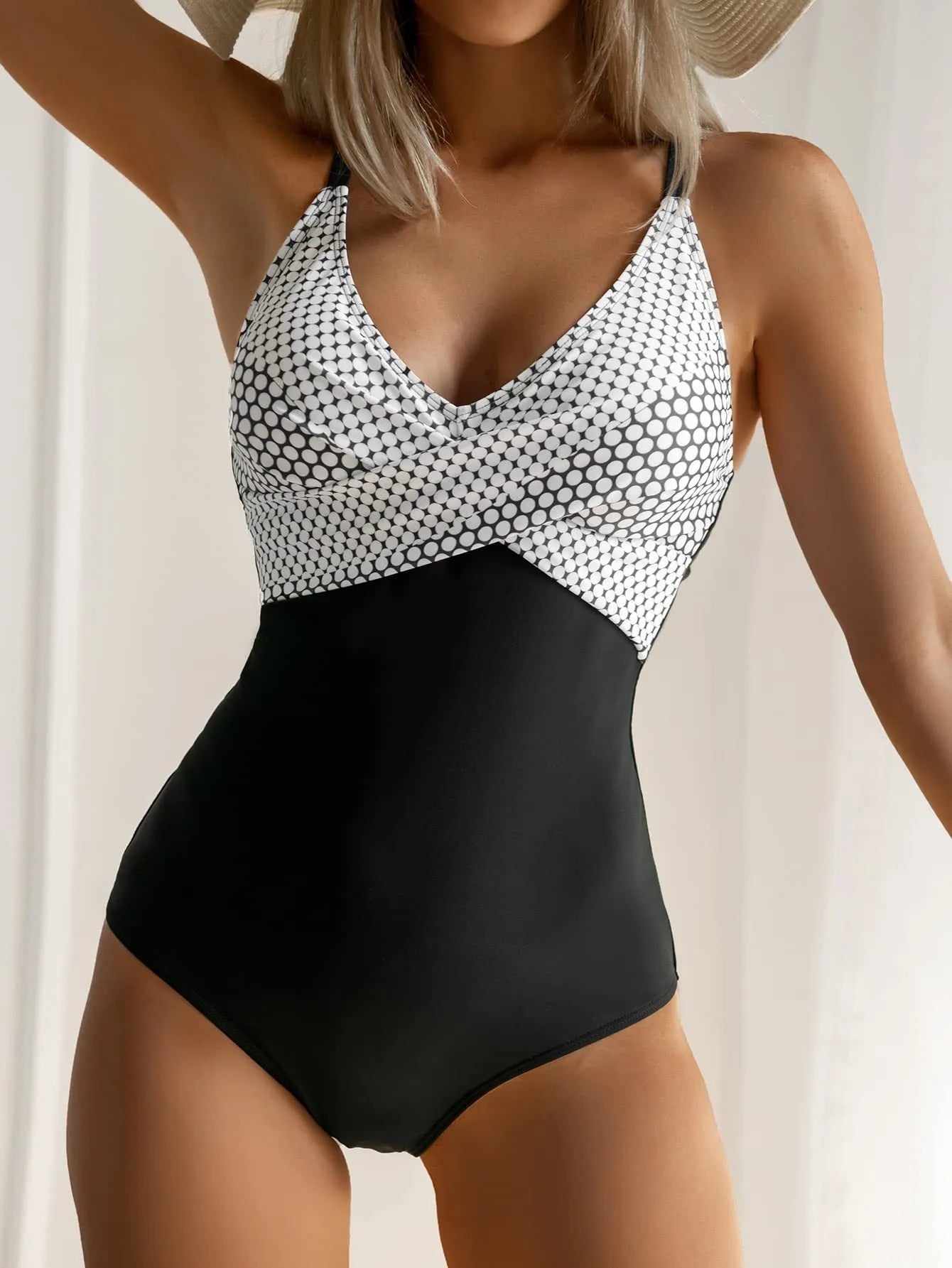 Printed one-piece bikini swimsuit with lace-up backless design in various patterns including leopard print and floral options.