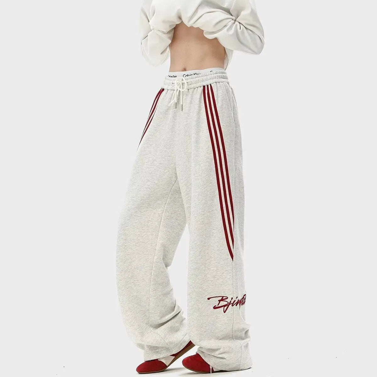 Men's striped loose straight-leg casual pants in black, white gray, or navy blue, sizes M to XXXL.