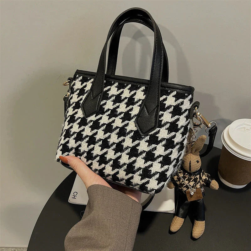 Stylish houndstooth shoulder bags in various colors, featuring a spacious square shape, adjustable strap, and classic checkerboard pattern.