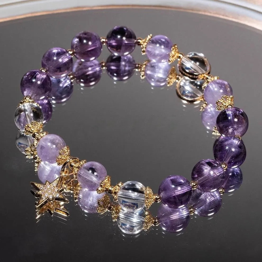 Handmade purple amethyst eight Awn star crystal bracelet for women in a gift box.
