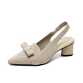 Women's black high heel sandals with closed pointed toe, decorative bow, and ankle buckle strap.