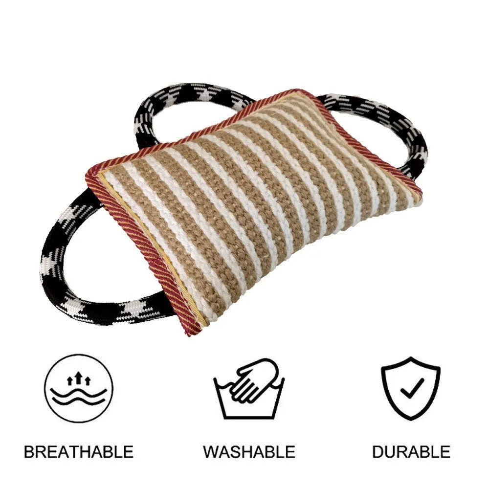Colourful dog tug toy with a jute bite pillow centre and three rope handles.