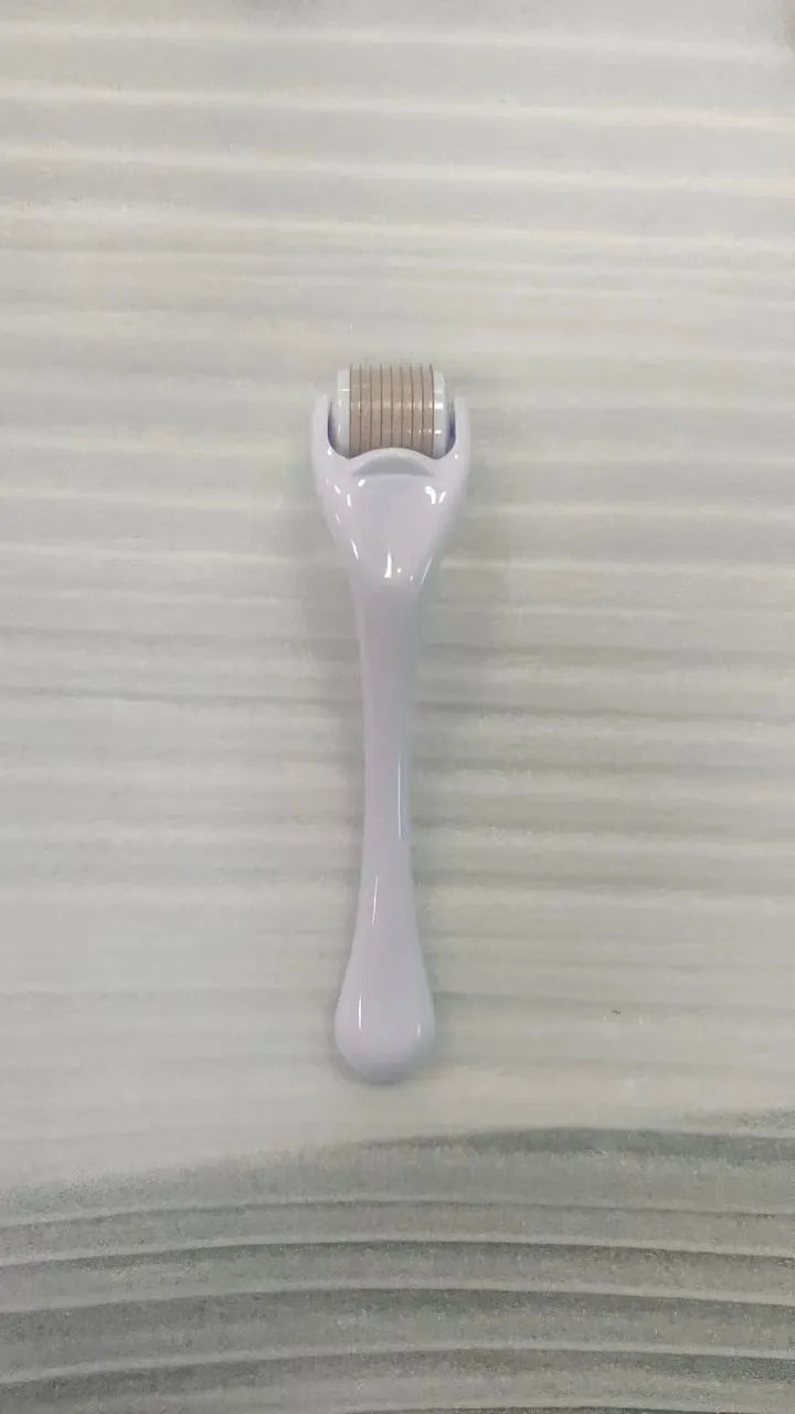 540 needle micro needle roller derma roller with black handle and purple wheel