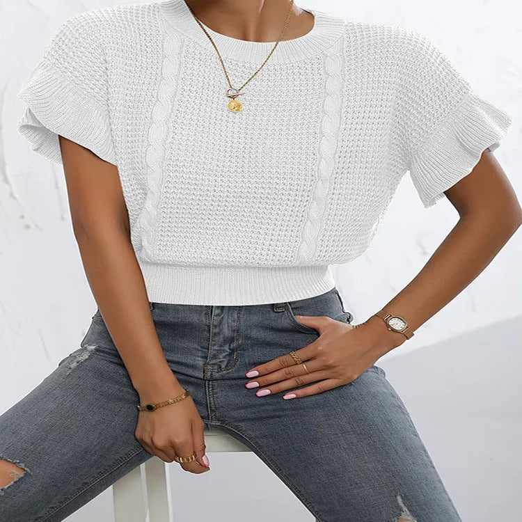 White knitted pullover sweater with twisted string ruffled short sleeves creating 3D pattern effect