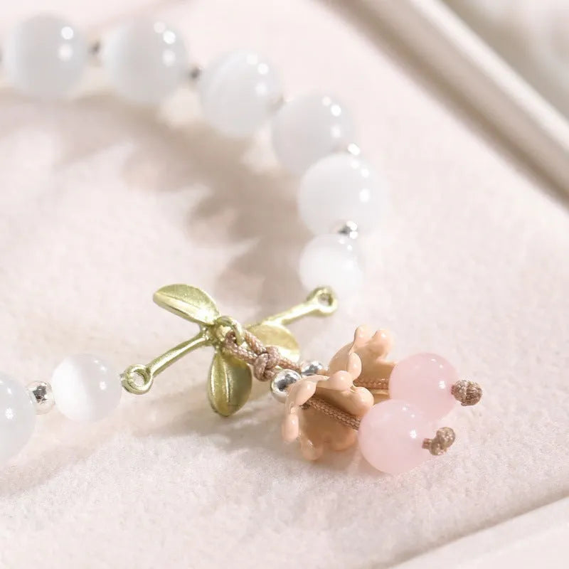 Adjustable cat's eye stone beaded bracelet with electroplated opal diamond-shaped beads in multiple colour options