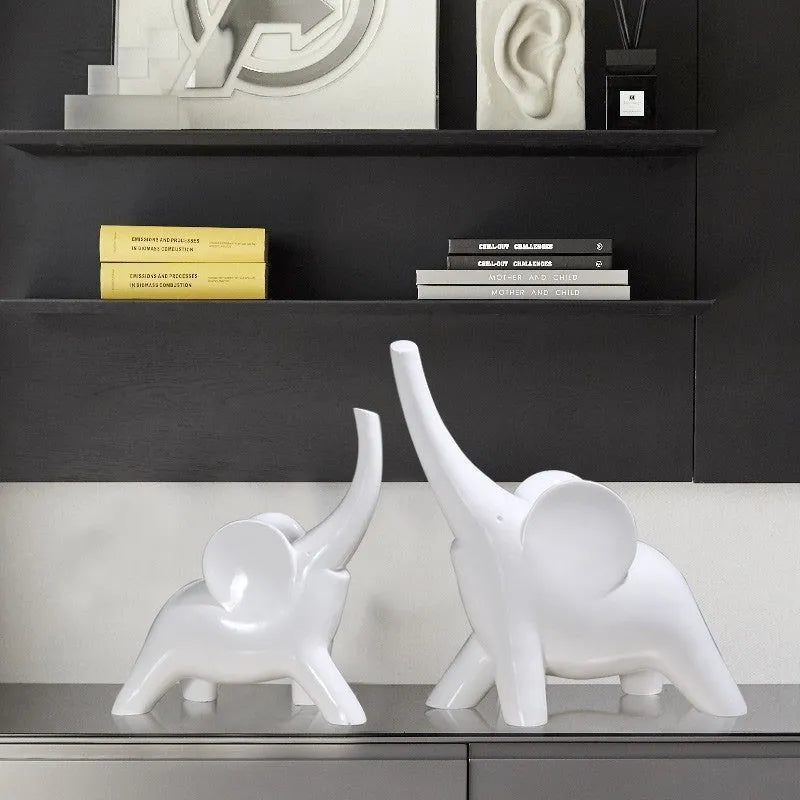Modern simple style resin elephant ornament in rose gold or white, available in large and small sizes.