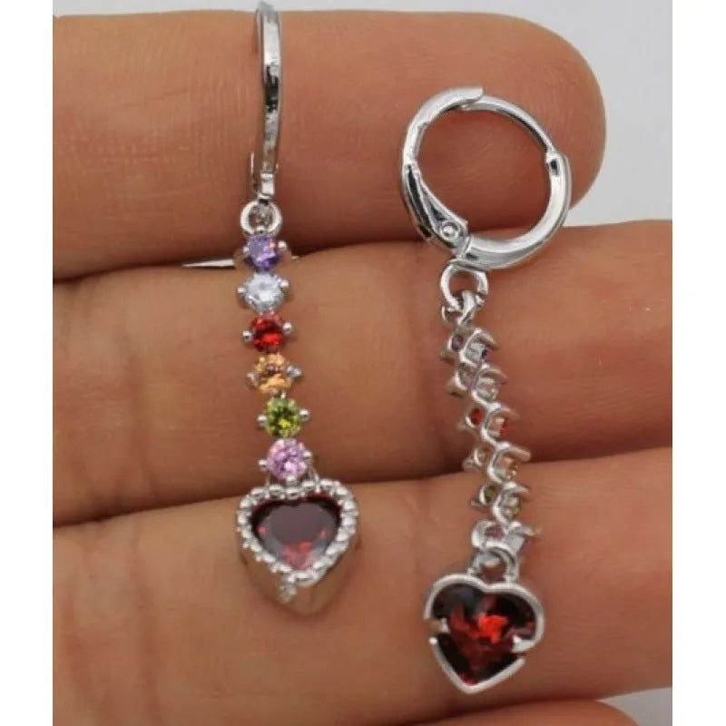 Heart-shaped alloy earrings for women in gold or silver tone with butterfly clasps