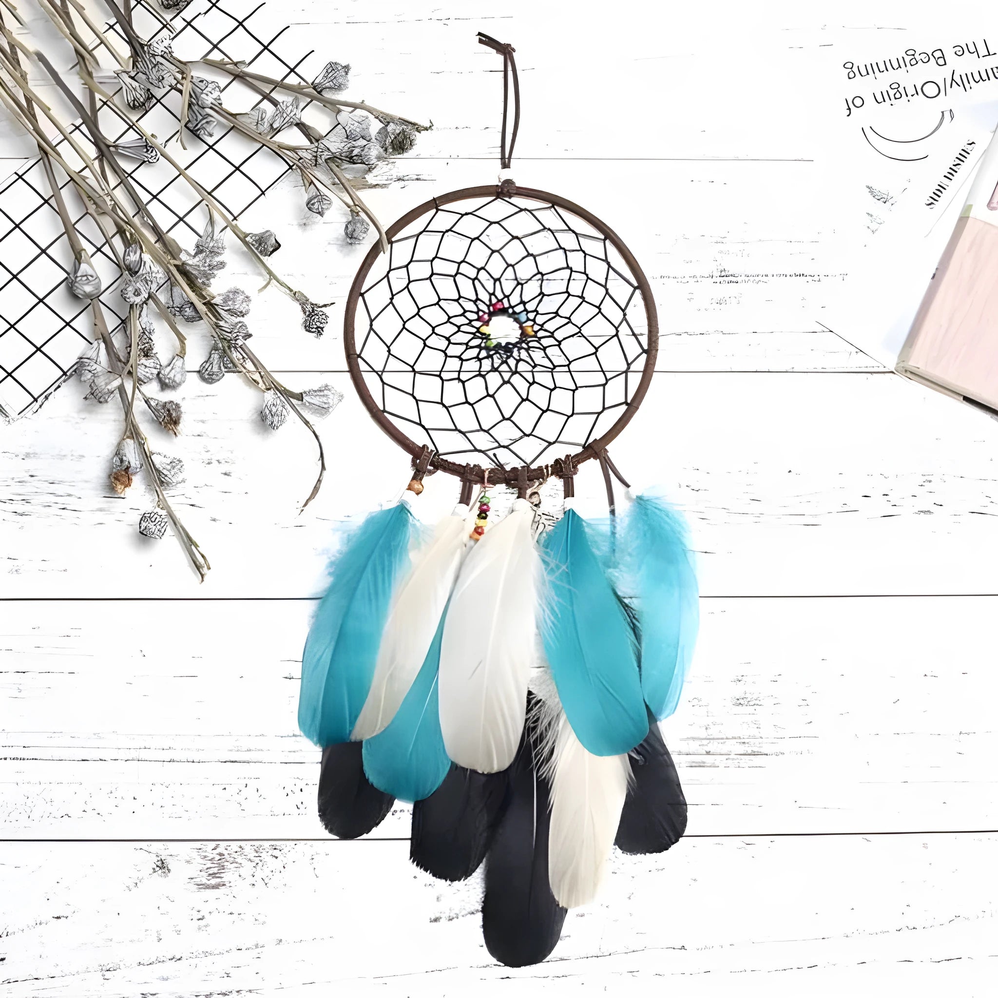 Dreamcatcher feather wind chime ornament in Ancient Dream colour, 16x50cm hanging on a wall