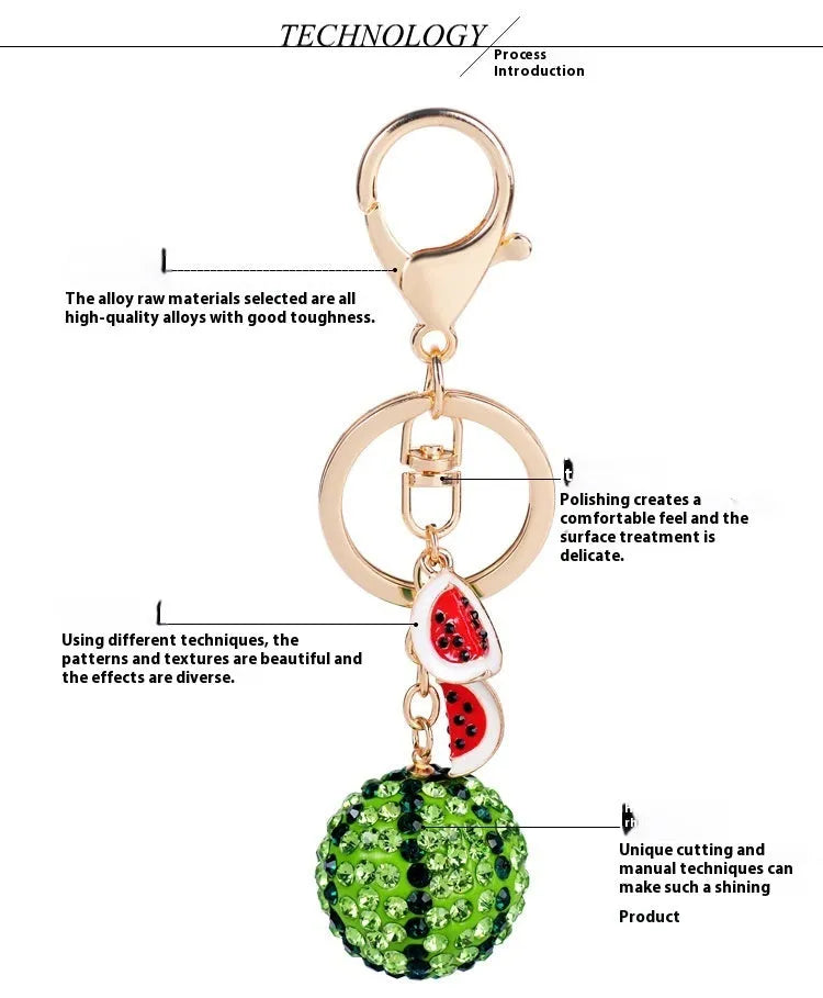 Green zinc alloy watermelon-shaped keychain measuring 12 cm.