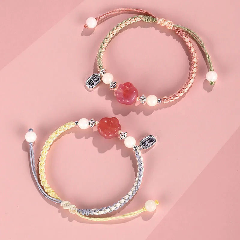 Red cat's paw woven couple bracelet with glass and coloured glaze in pastoral style