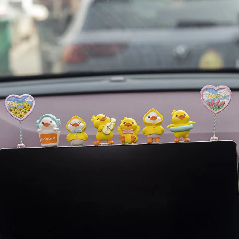 Yellow and white PVC cartoon duckling car decoration set with six small ducks and one welcome sign