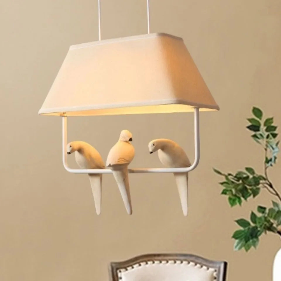 Iron bird chandelier ceiling lamp with fabric shade in a multi-bird design