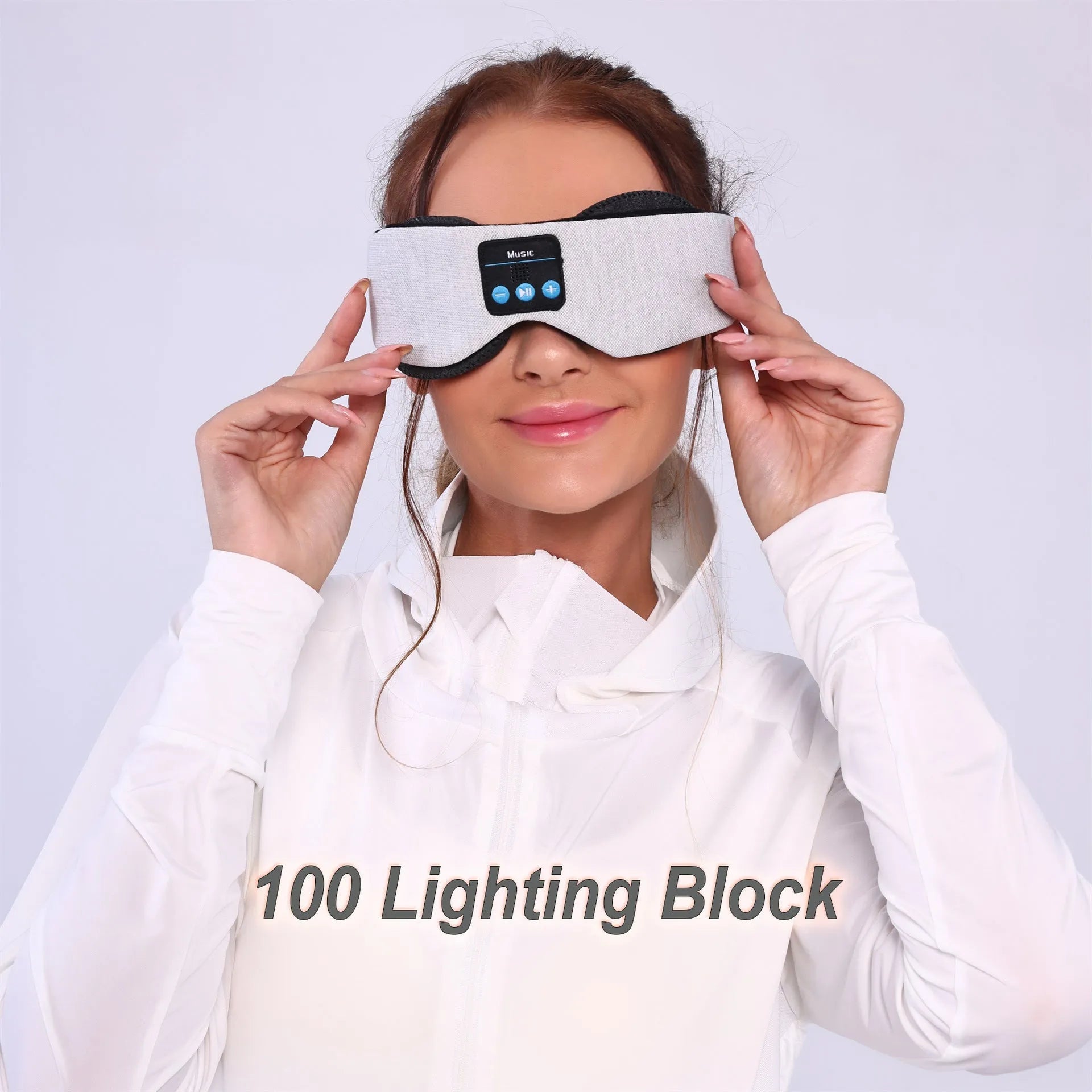 Grey Bluetooth sleeping eye mask with outline design showing integrated speaker placement