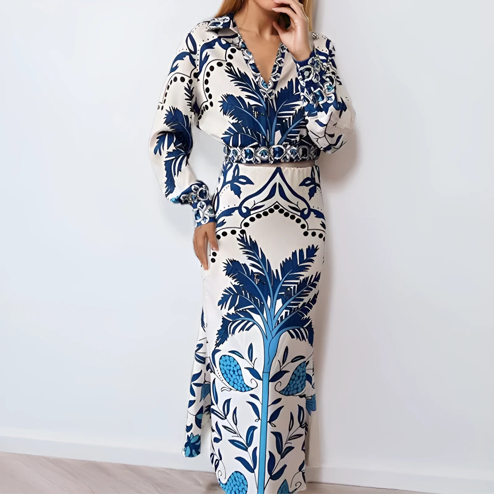Women's long sleeve polyester top and long skirt co-ord set in picture colour.