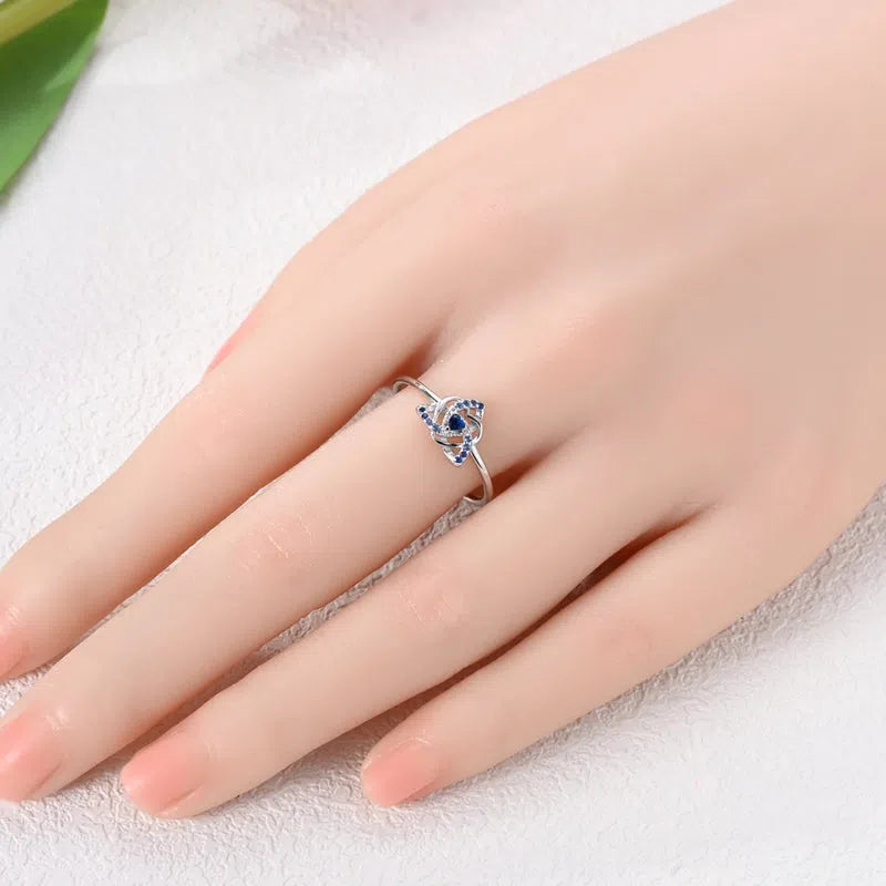 Sterling silver 925 heart-shaped dreamcatcher ring with adjustable opening in blue KSR080