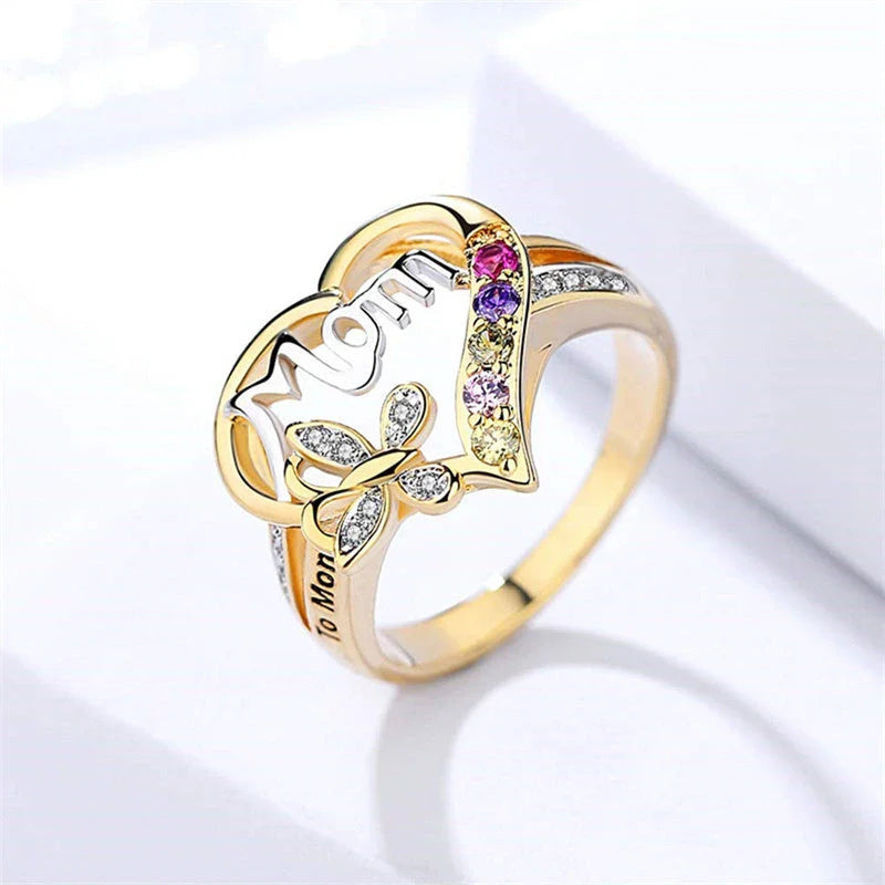 A sparkling heart-shaped ring with a captivating rhinestone butterfly motif, a thoughtful Mother's Day gift.