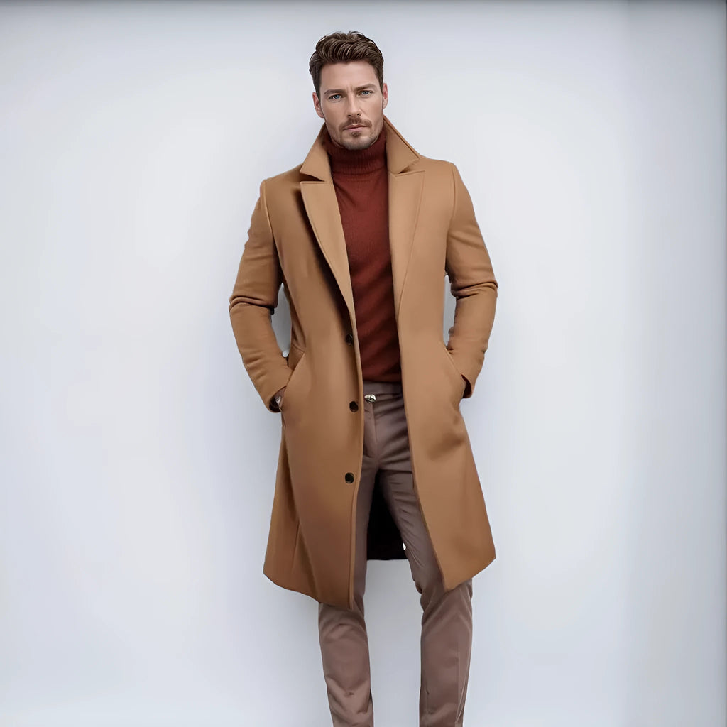 Men's mid-length solid colour woolen coat in dark gray, side view, showing thick fabric and side seam pocket.