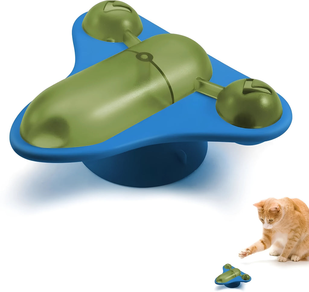 Blue interactive pet puzzle feeder toy with snack cabin, bell, and catnip on a suction cup base.