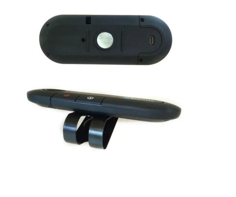 Black vehicle-mounted Bluetooth handsfree unit clipped to a car sun visor, with car charger and cable.