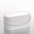 Pink gradient portable LED makeup mirror storage box with open lid showing silver mirror and storage compartment.
