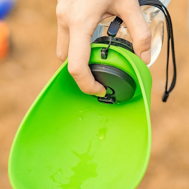 Blue plastic pet water bottle with drinking bowl showing 680ml capacity and key lock mechanism