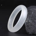 Gao Bing jade bracelet in ice-like white moonlight colour on a wrist, showing flat rod and round rod style options.