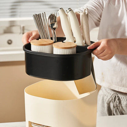 Rotating multipurpose kitchen storage organizer with 4-compartment spice rack, durable plastic construction, and 360-degree rotating mechanism for easy access to cooking tools and seasonings.