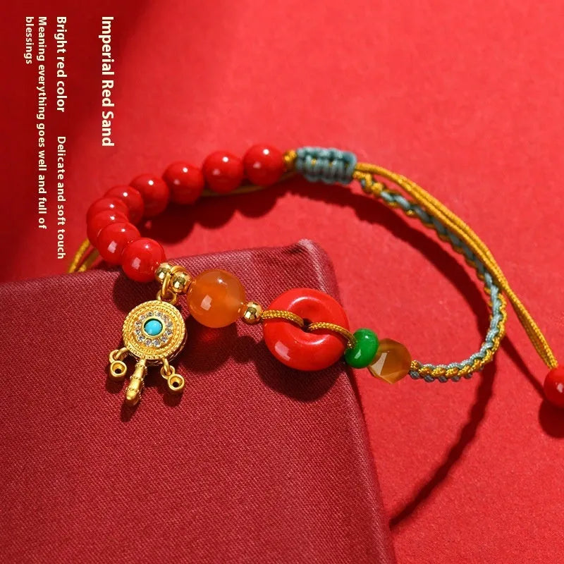 Hand-woven cinnabar peace blessing bracelet in emperor red sand colour with geometric national style design