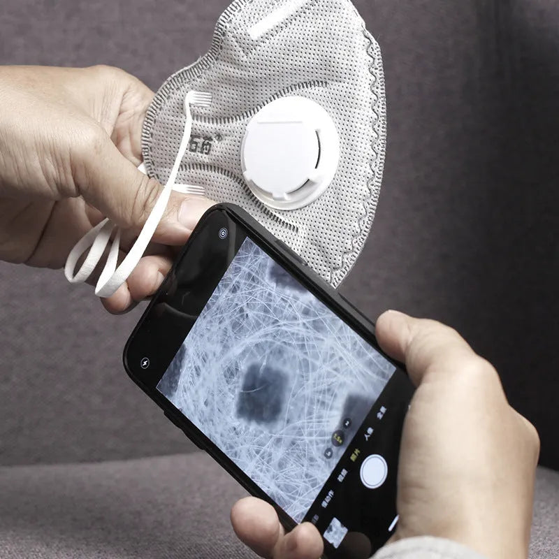 Black and silver 400X mobile phone microscope lens with aluminum alloy TPU case for iPhone.