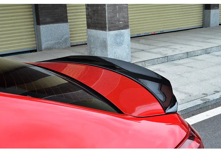 Mazda 3 Axela Exela sports tail blade trim for 2014-2021 models in bright black finish