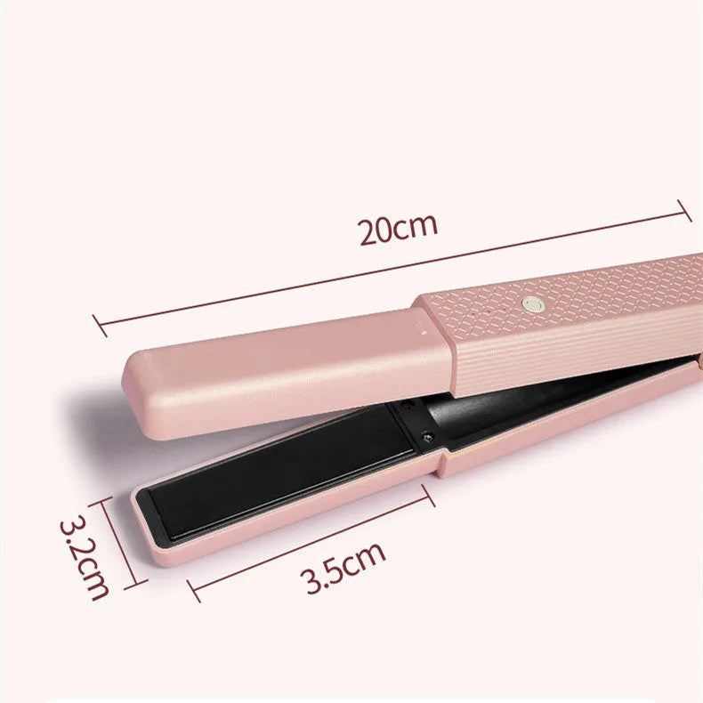 Compact pink cordless USB hair straightener and curler with ceramic plates on a white background.