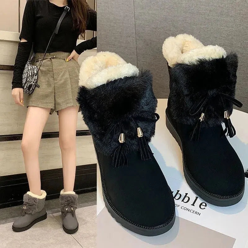 Mid-length women's snow boots with front zip, microfiber upper, chunky mid heel, black or grey, sizes 35-40
