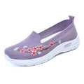 Women's embroidered woven casual pump in wine red with a low heel and anti-slip sole.