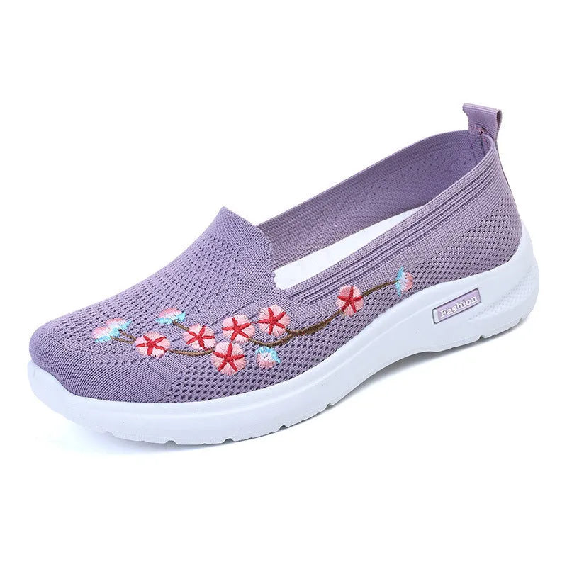 Women's embroidered woven casual pump in wine red with a low heel and anti-slip sole.